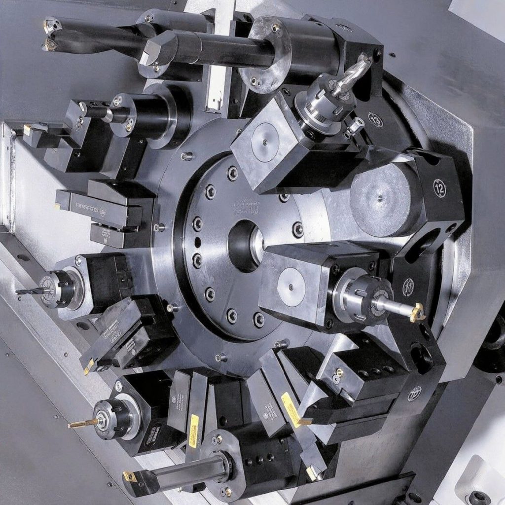 Револьверная головка с приводными позициями Револьверная головка с приводными позициями